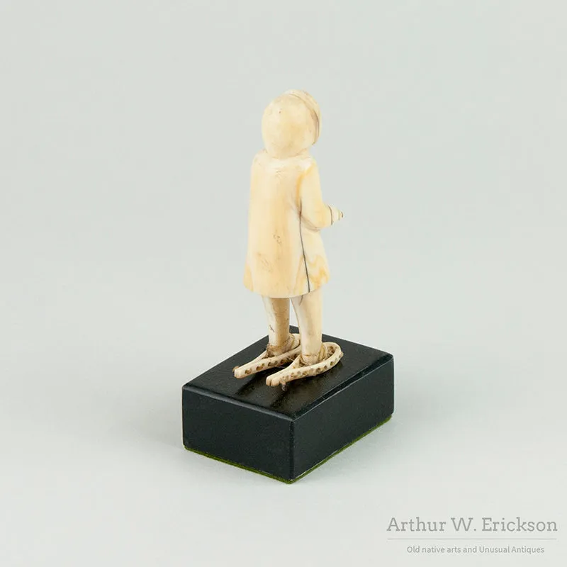Inuit Ivory Carving of Man on Snowshoes